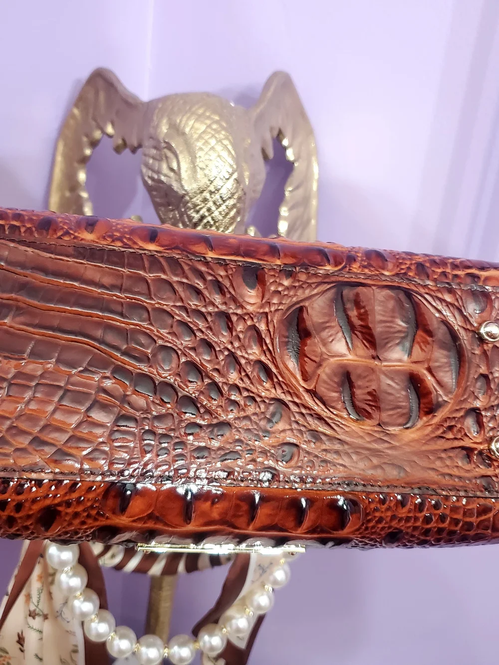 Brahmin Croc-Embossed Brown Satchel with Scarf-Wrapped Handles and Pearl Accent